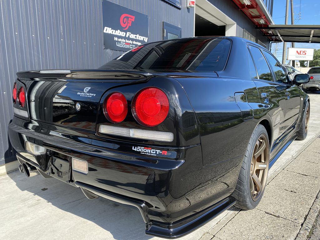 R34 4DOOR GT-R FRP BODY KIT - Okubo Factory